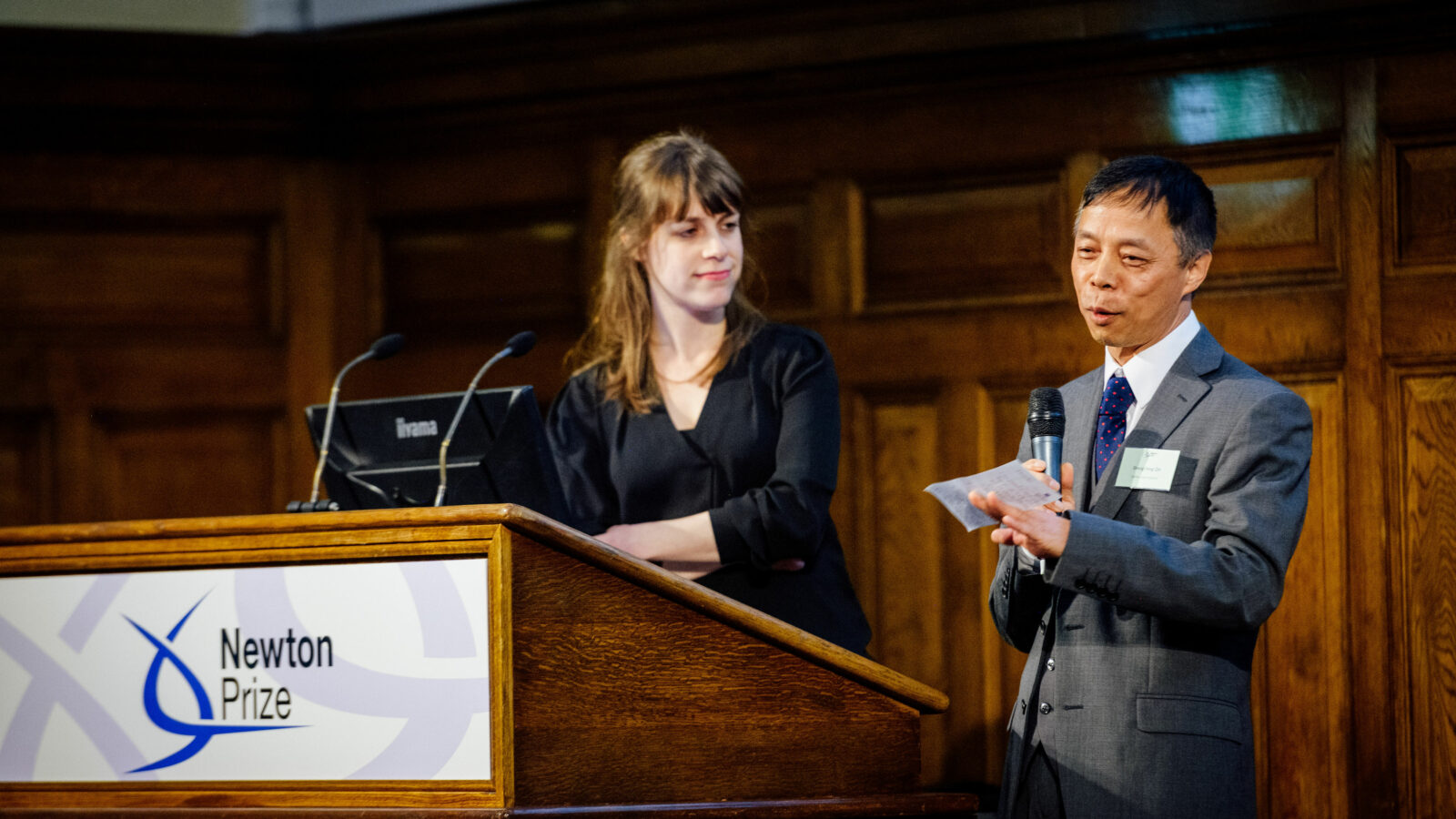 Image of Newton Prize 2019 China winner speaking on stage at London prize event